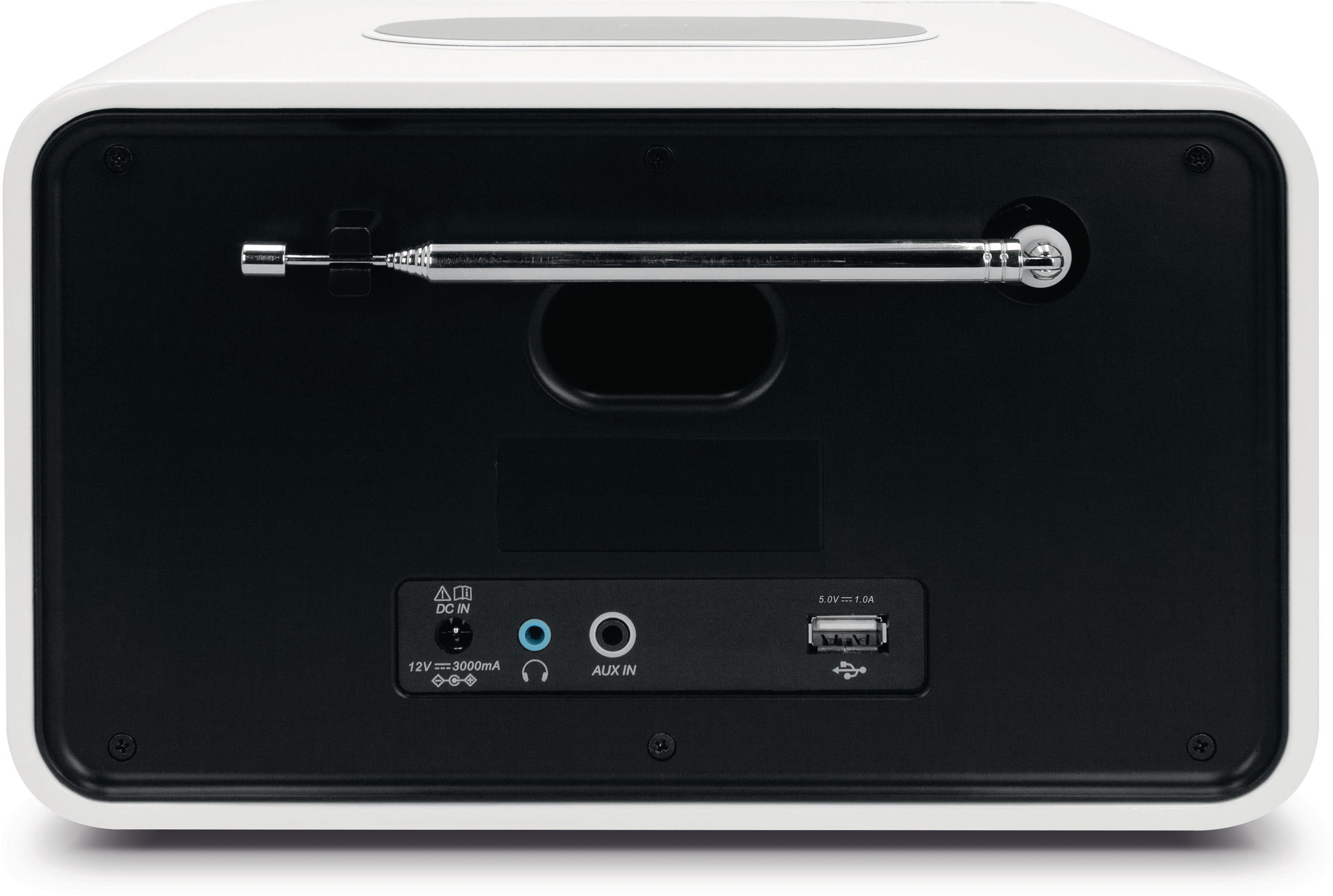 Weißes Radio mit schwarzer Lautsprecher-Rückseite. Antenne, AUX- und USB-Anschlüsse sichtbar.