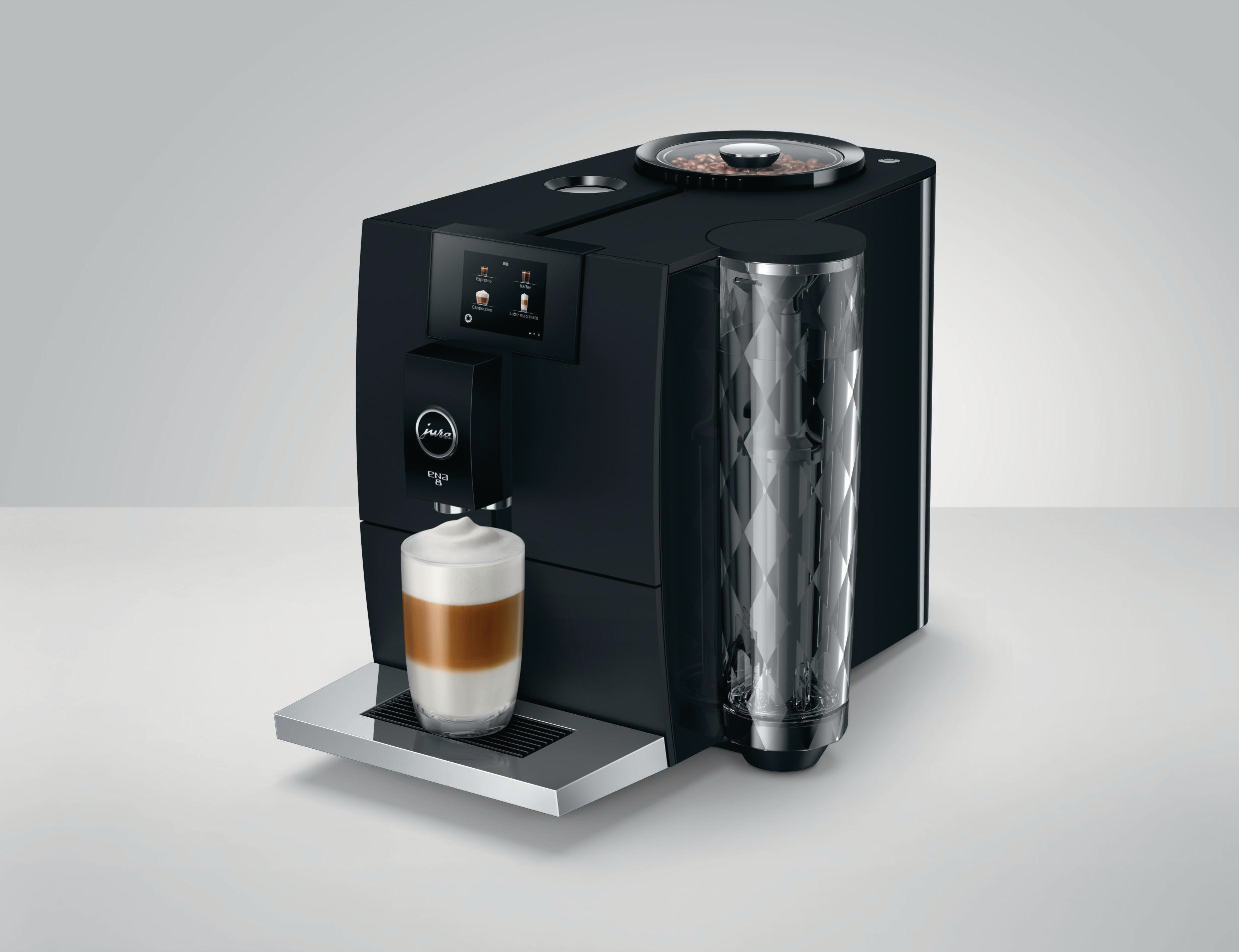 Schwarze Kaffeemaschine mit Glasbehälter und Anzeigefeld; Kaffee wird ausgegeben.