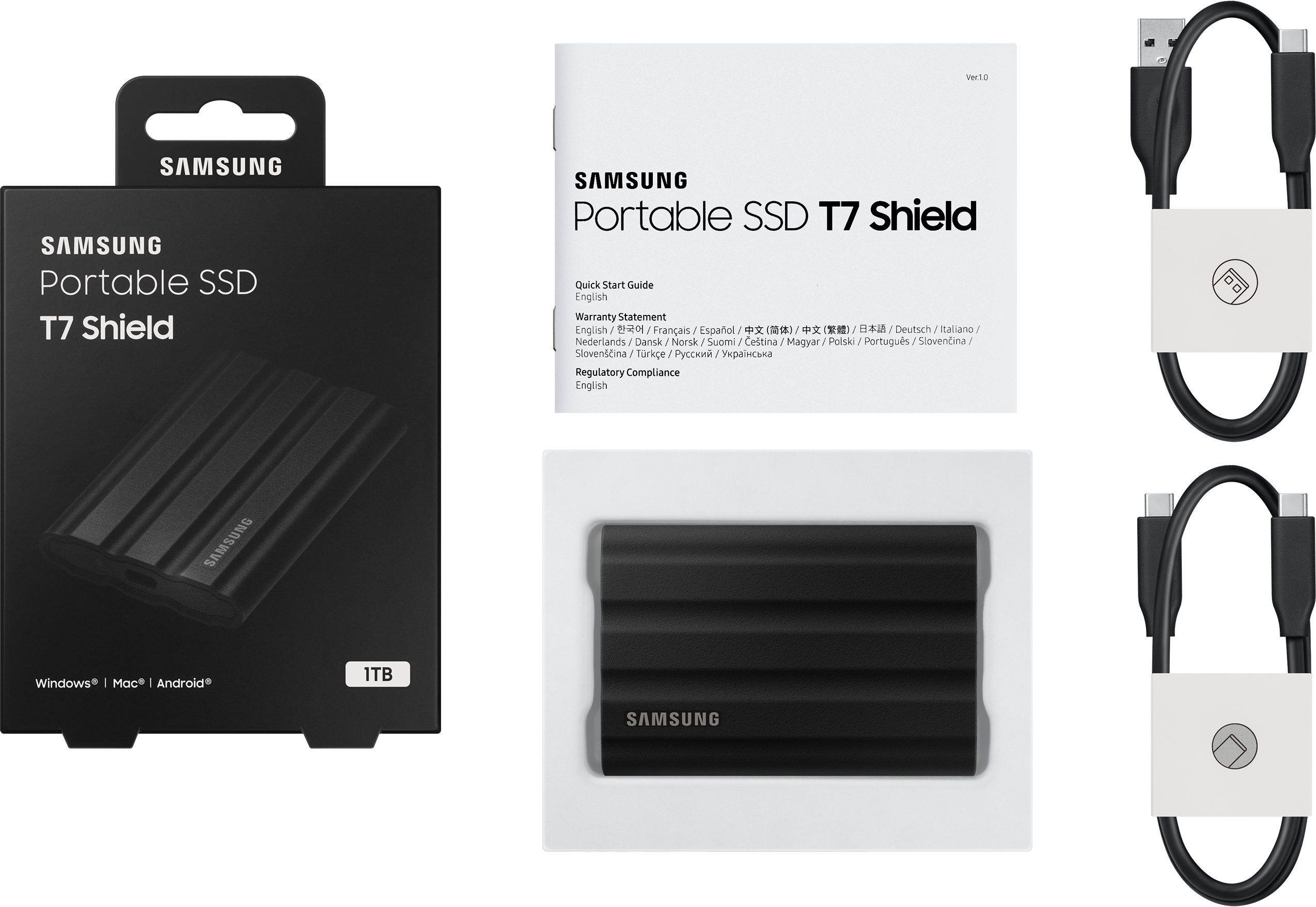 Samsung T7 Shield SSD mit Box, Handbuch und Kabeln. Schwarze, gerippte SSD. Weiße Etiketten auf Kabeln.
