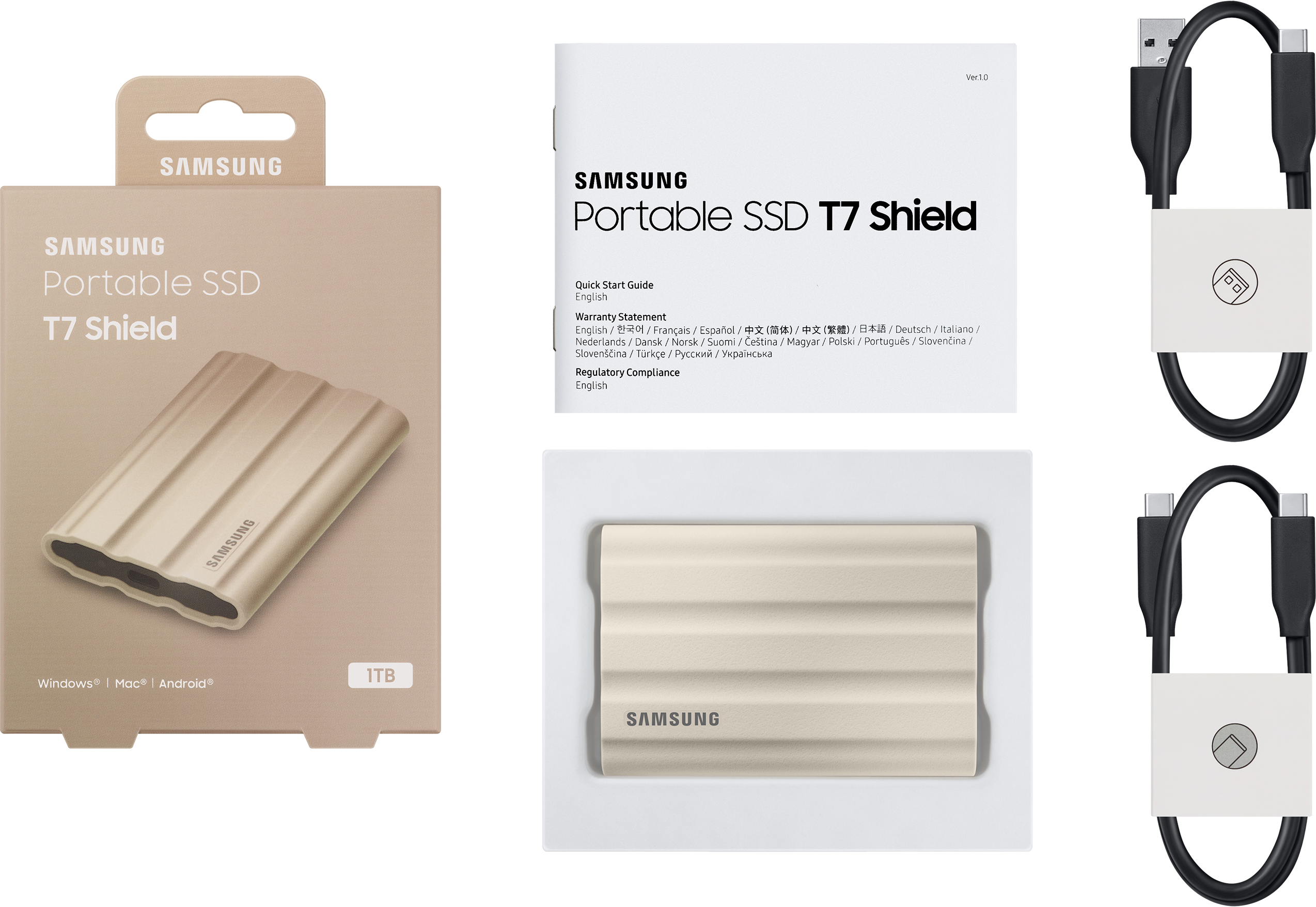 Une boîte ouverte avec un SSD portable, un guide de démarrage rapide et deux câbles.