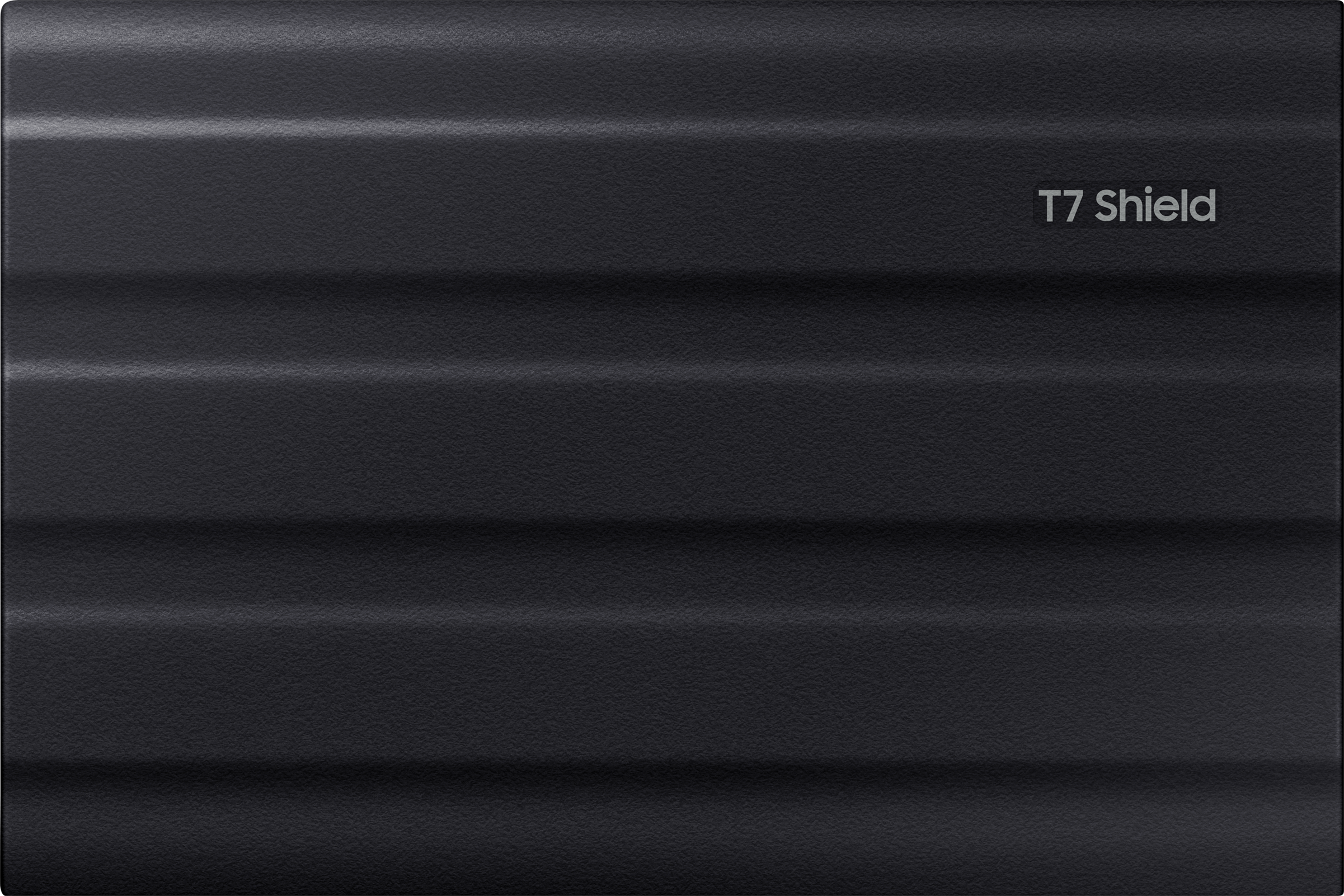 Schwarze, strukturierte externe Festplatte mit dem Aufdruck "T7 Shield".