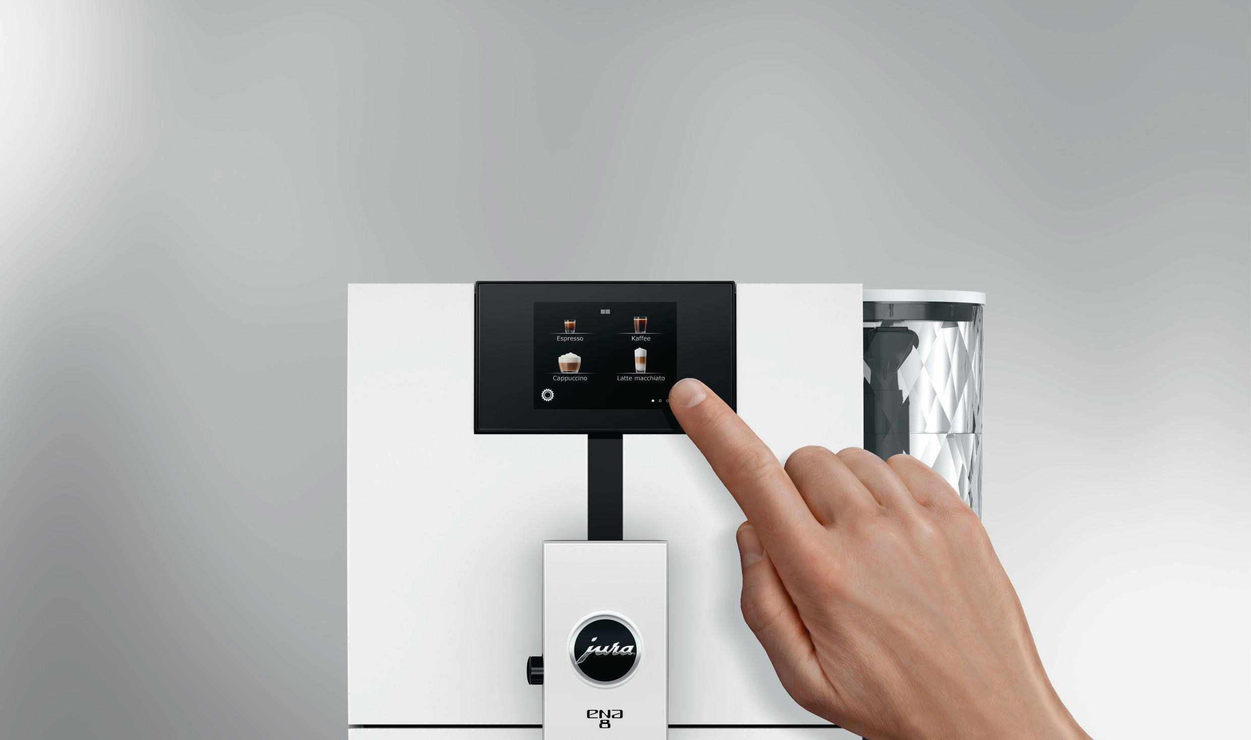Eine Hand berührt den Bildschirm einer Kaffeemaschine. Zeigt Espresso, Cappuccino, Latte und Kaffee.