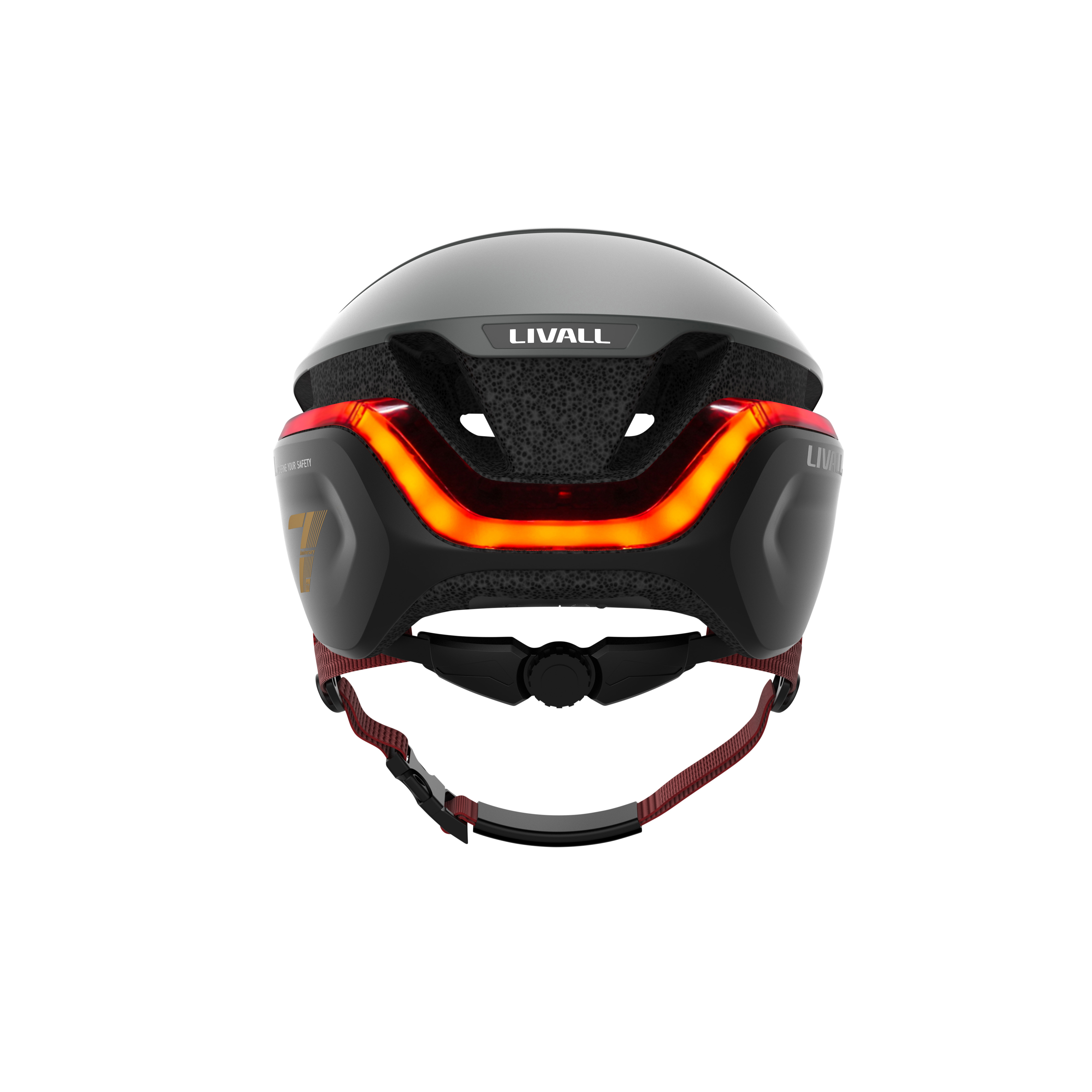 Ein schwarzer LIVALL Fahrradhelm mit integriertem rotem LED-Licht und Riemen.