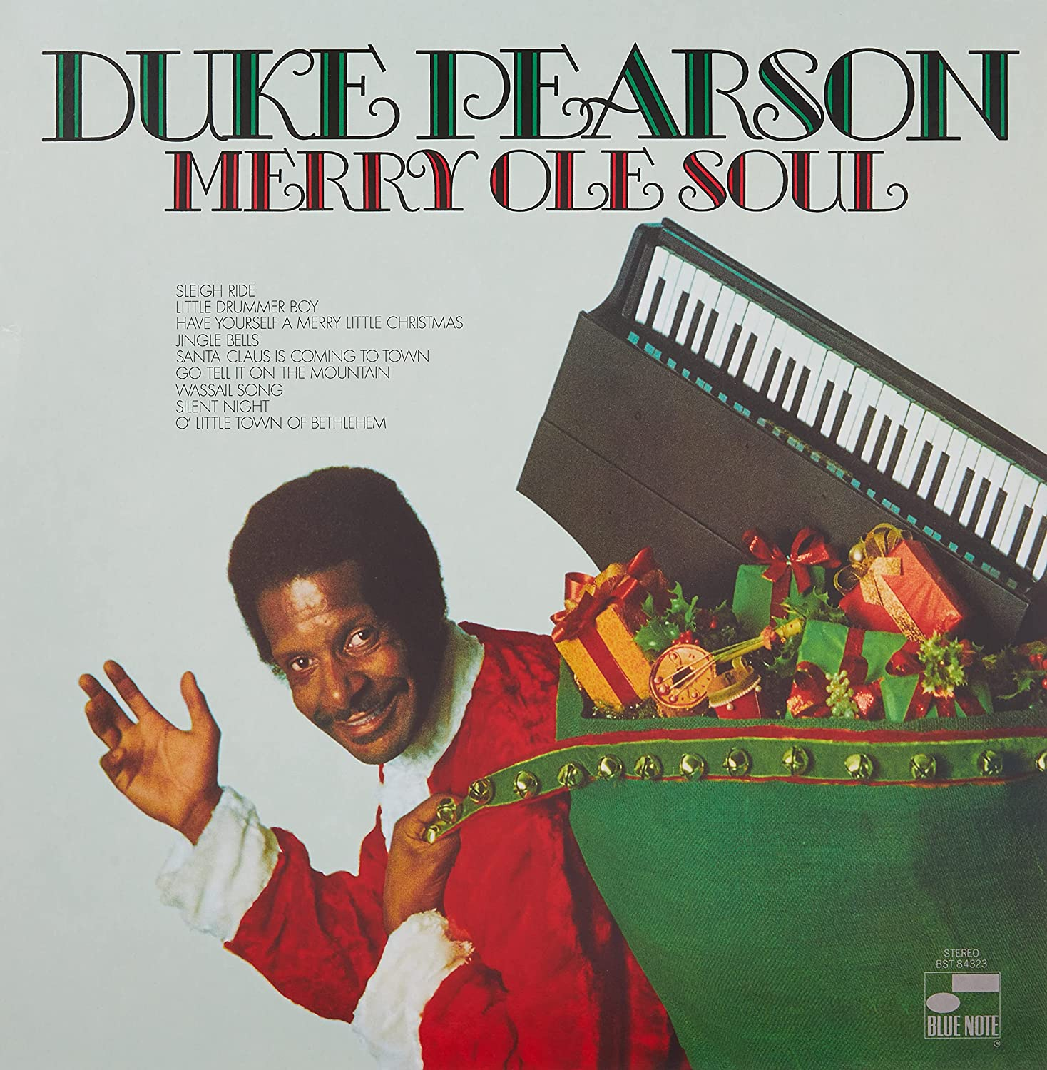 Album borító: Duke Pearson Mikulás-ruhában, zöld ajándékzsákkal és zongorabillentyűzettel. Cím: Merry Ole Soul.