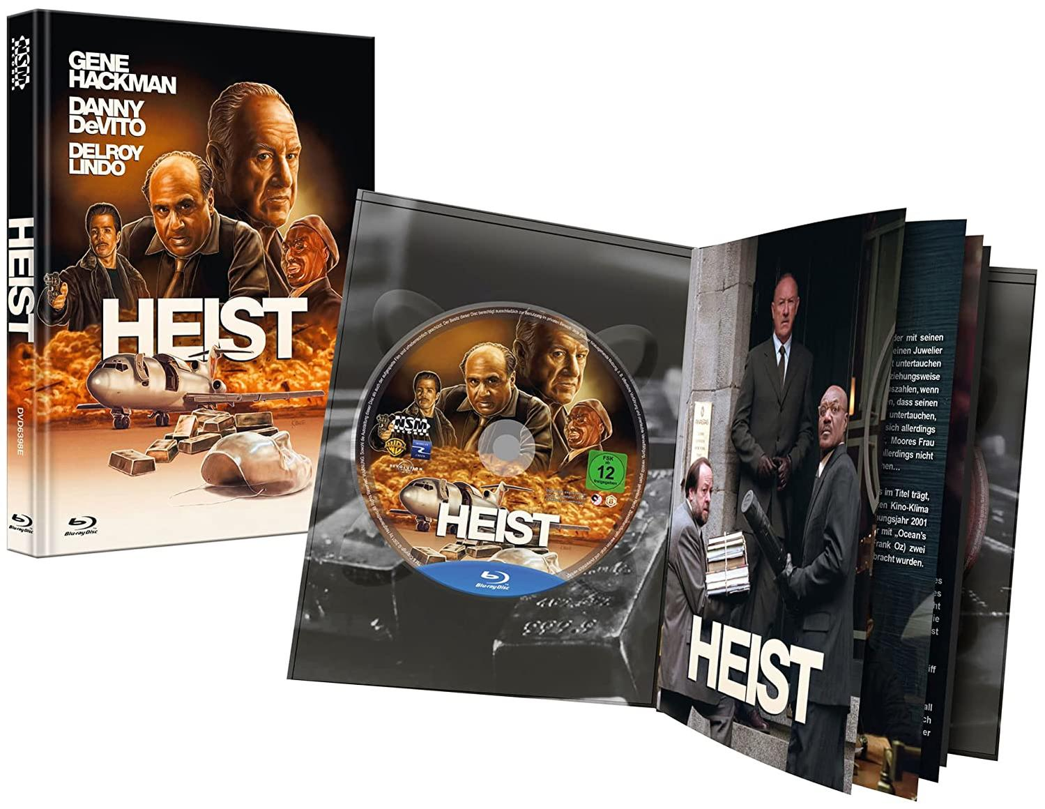 Heist-Film-DVD-Hülle geöffnet, mit der DVD-Disc und Bildern aus dem Film.