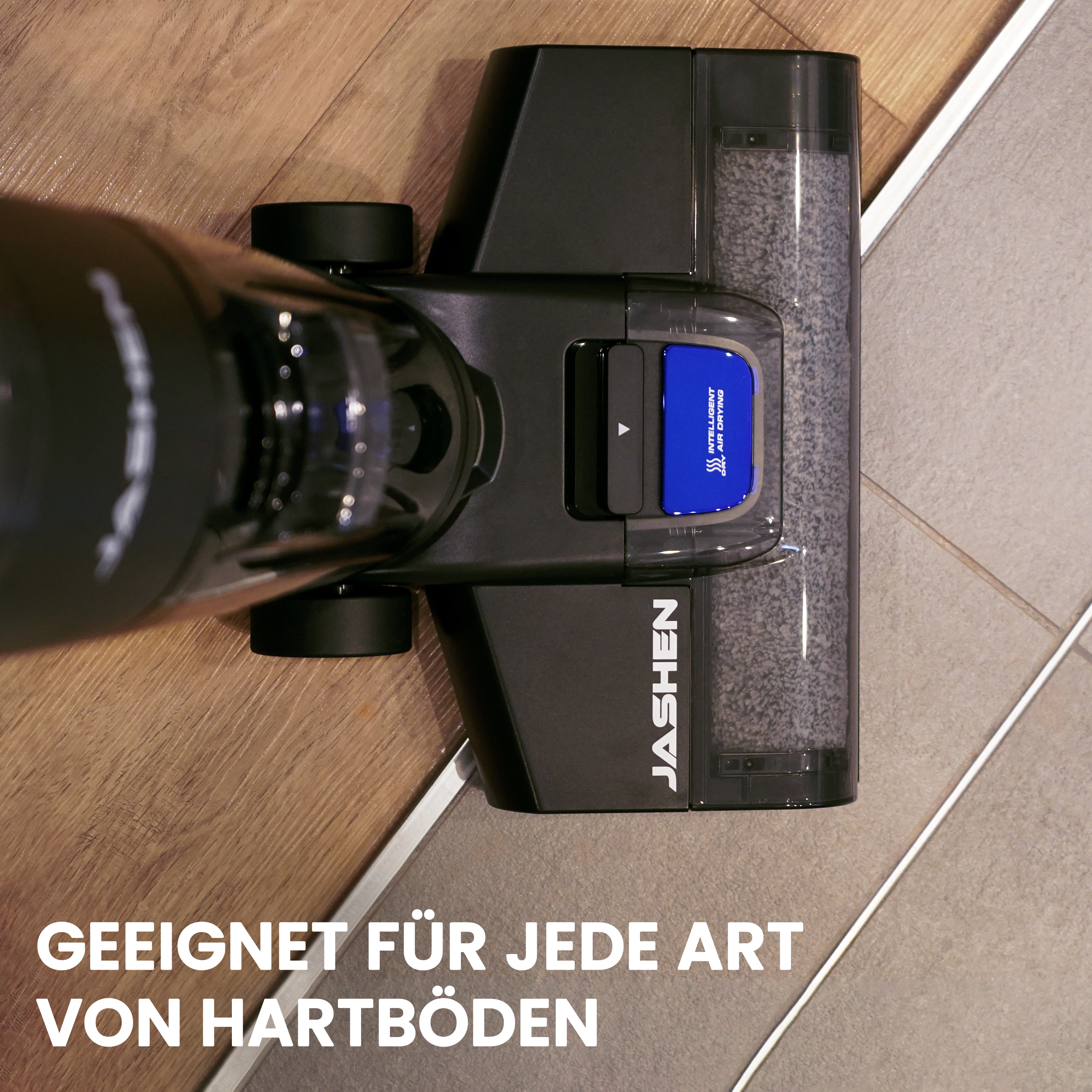 Schwarzer und grauer Staubsaugerkopf auf Holzboden. Text: 'Geeignet für jede Art von Hartböden'.