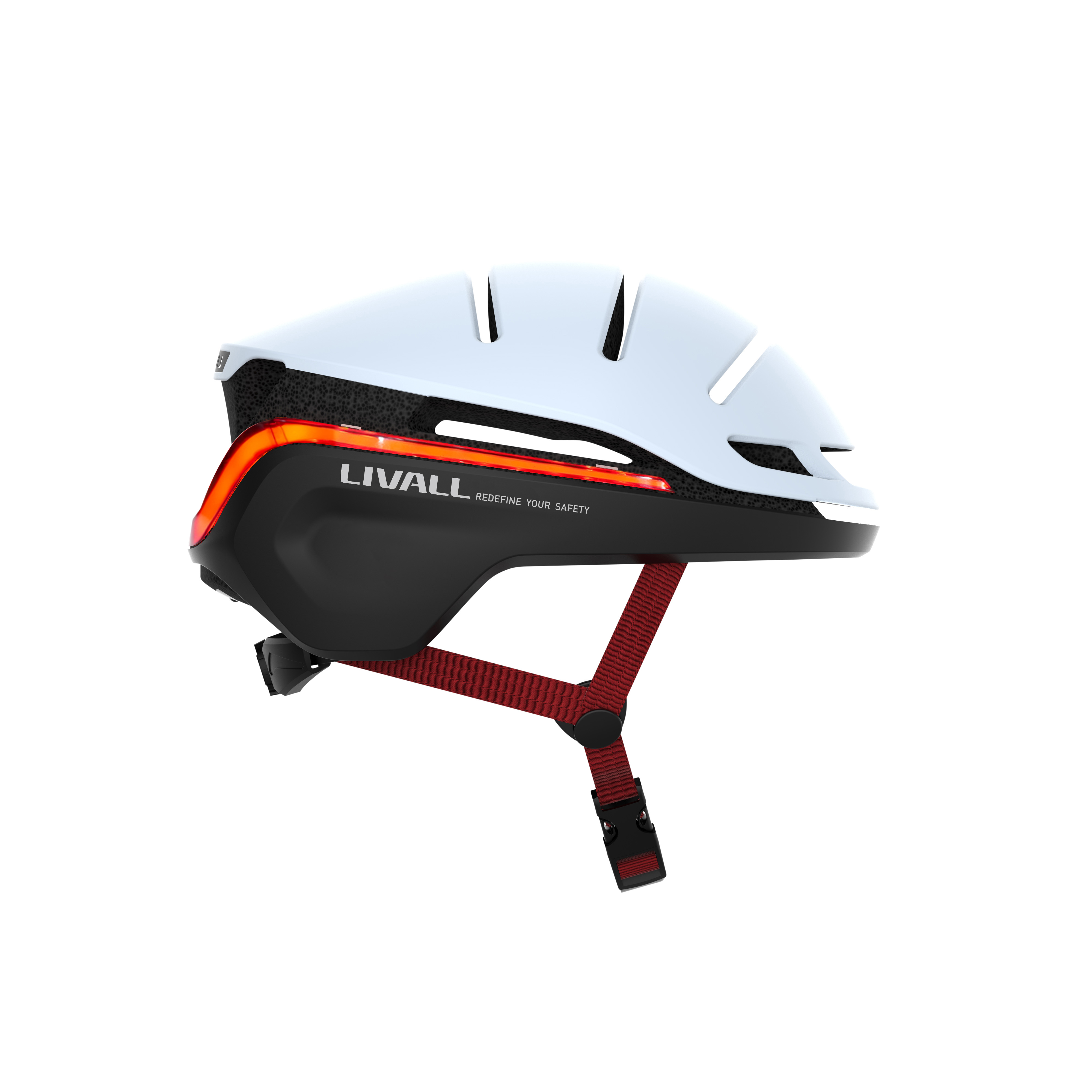 Weiß-schwarzer Fahrradhelm mit rotem Licht und rotem Riemen.
