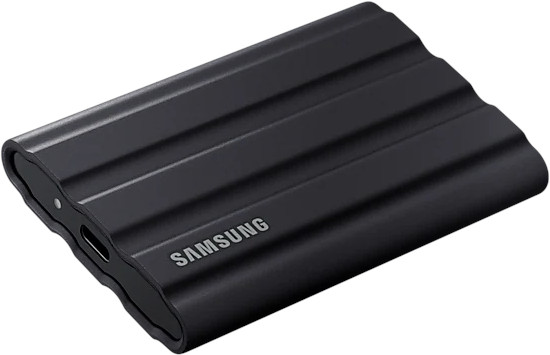 Black, ribbed portable hard drive with the Samsung logo, against a white background.