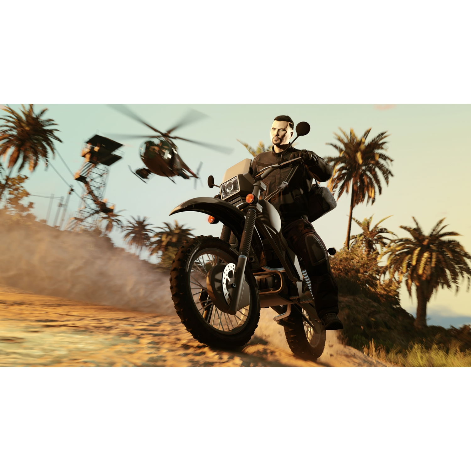 Un hombre en moto conduciendo por tierra, con helicóptero y torre al fondo.