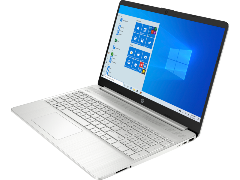 Laptop plateado sobre una superficie blanca. La pantalla muestra el escritorio de Windows.
