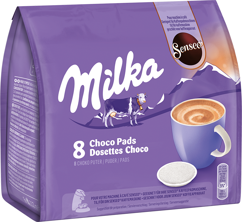 Egy lila Milka csomag tejcsokoládé párnákkal, egy tehénnel és egy csésze csokoládéval.