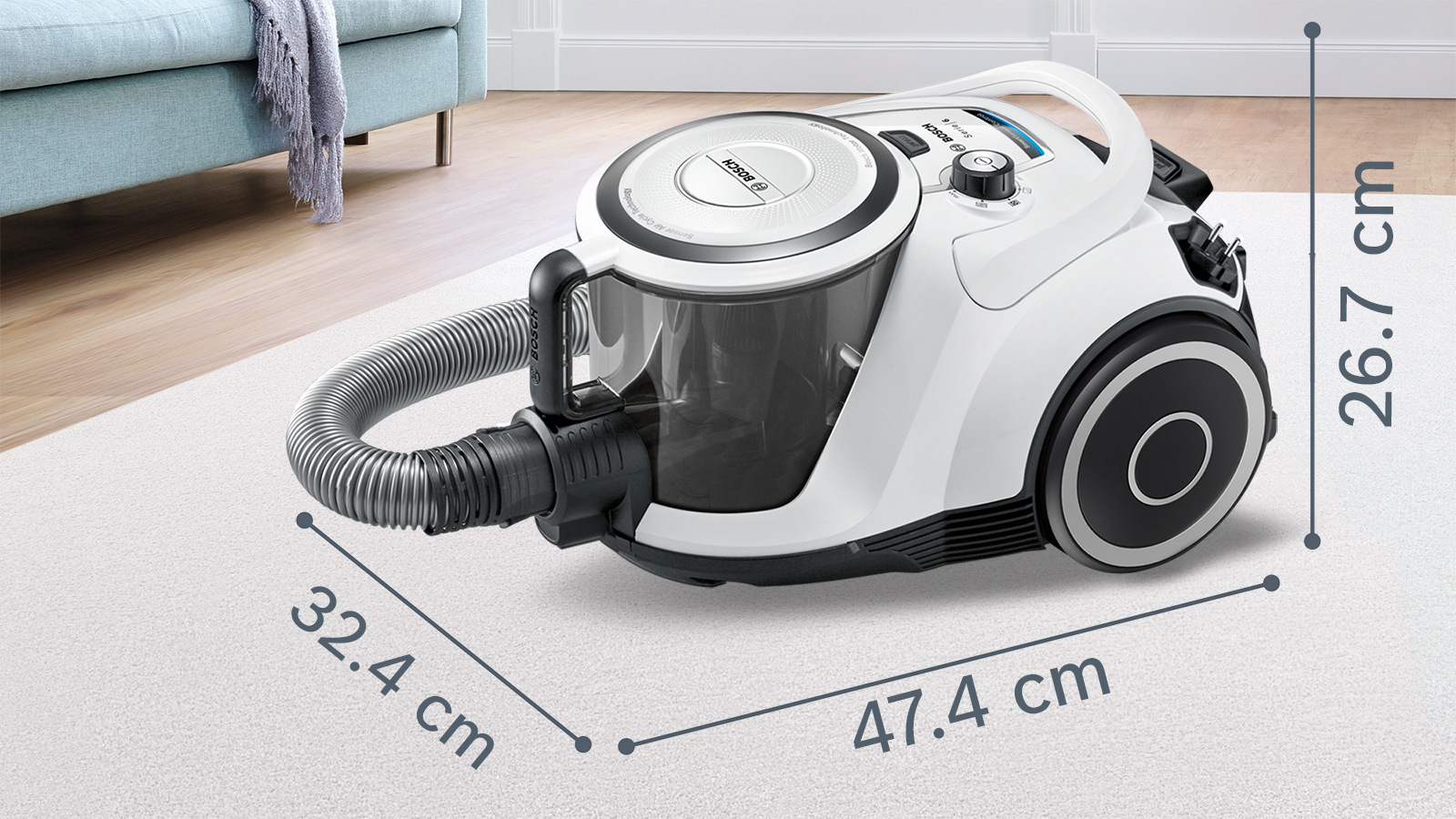 Weißer Staubsauger mit Maßangaben: 47,4 cm lang, 32,4 cm breit und 26,7 cm hoch.