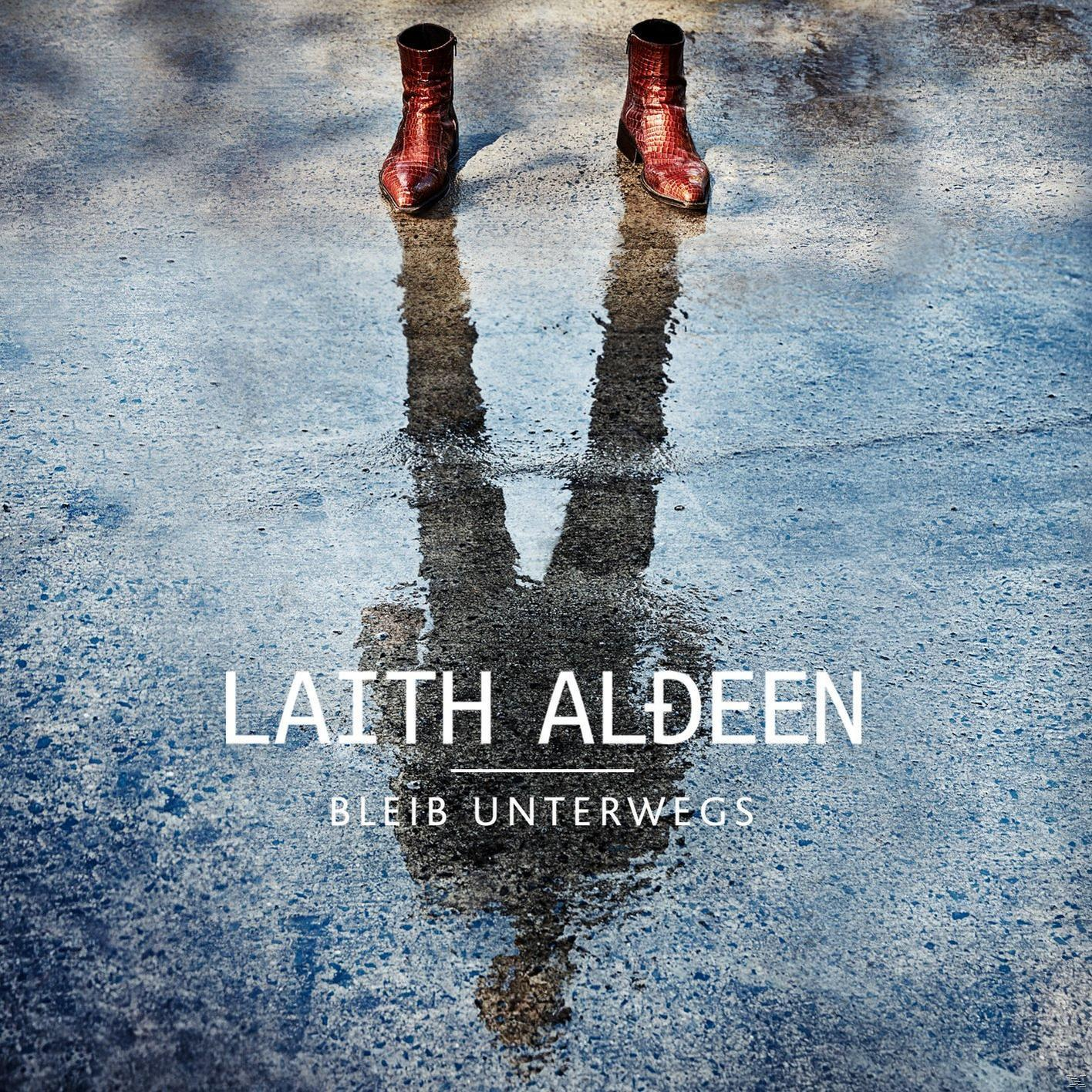 Albumcover von Laith Al-Deen, mit Beinen und Reflexion auf nasser Oberfläche. Text sichtbar.