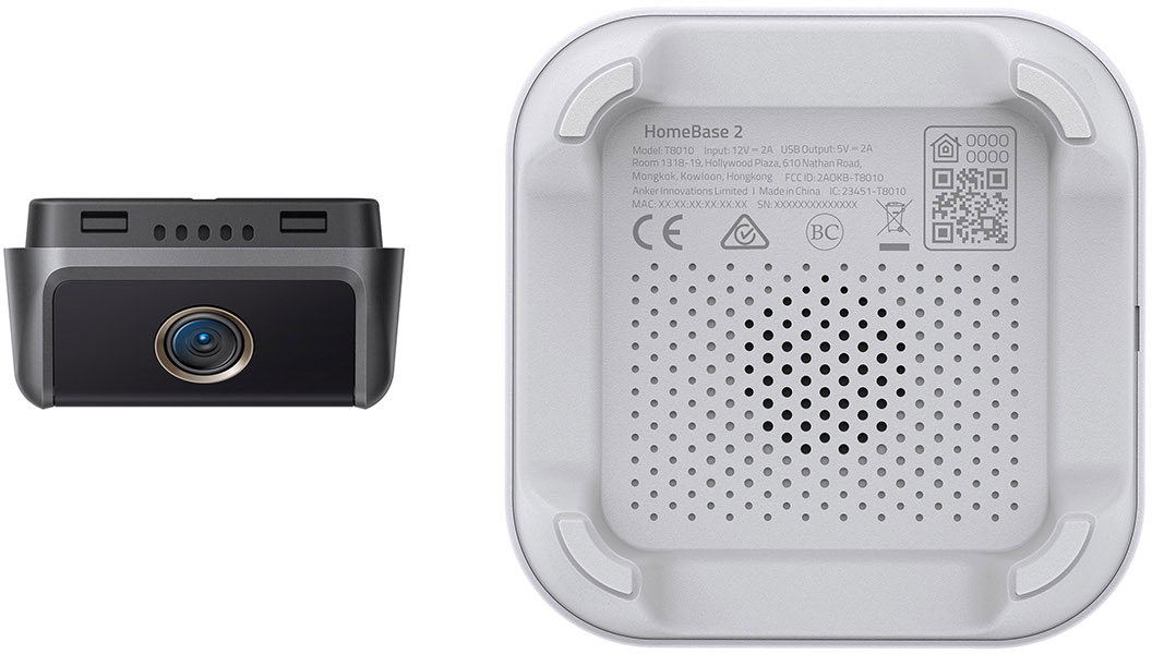 Two parts of a device, front with a lens and back with ports.