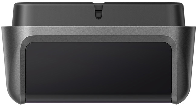A dark grey device with a top slot and a recessed front panel. Angled view.