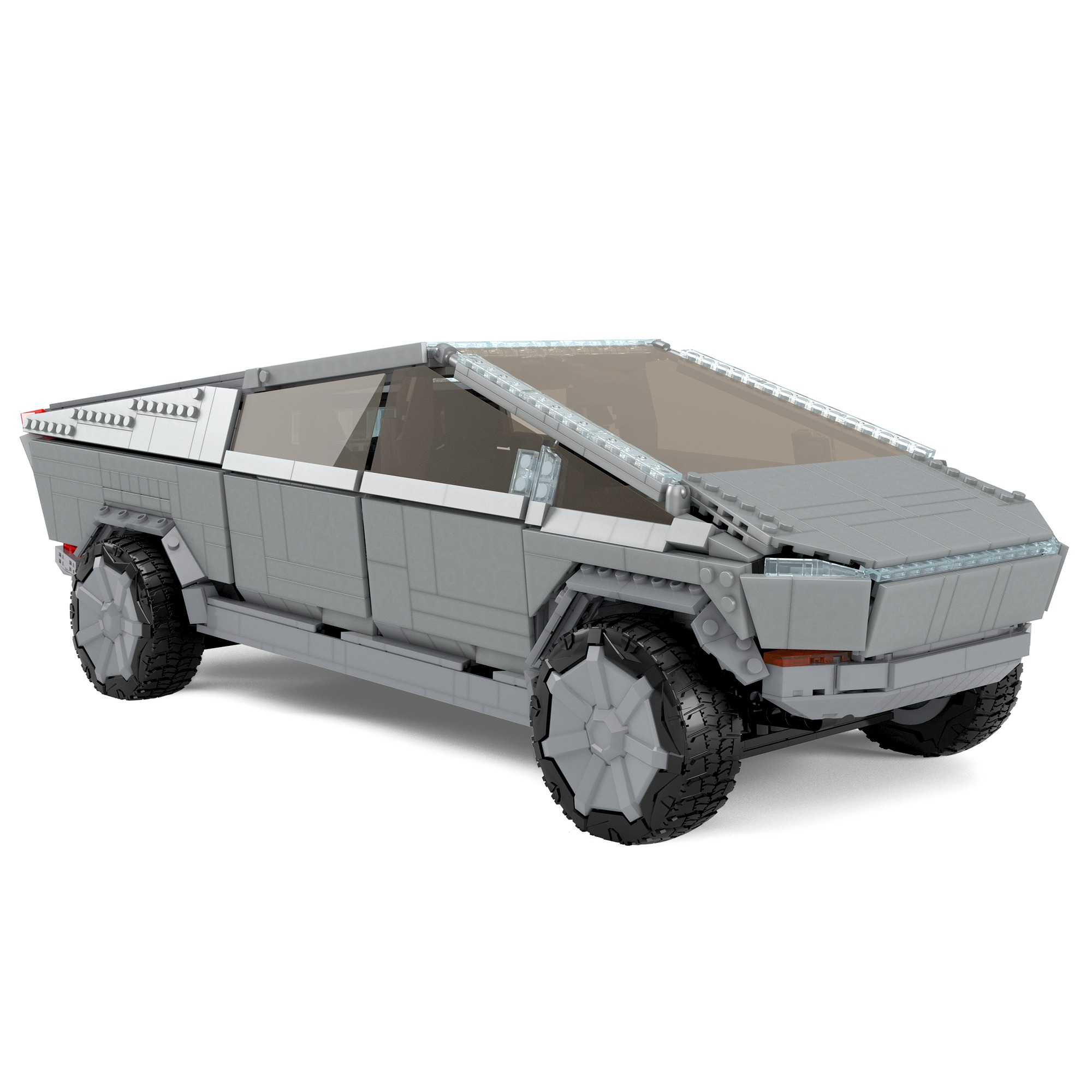 Graues Lego Cybertruck-Modell mit schwarzen Rädern, weißer Hintergrund.