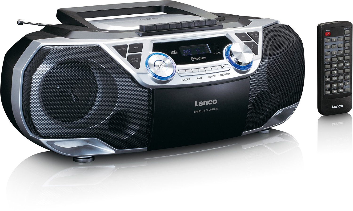 A black and silver boombox with a CD player, cassette recorder, and remote. It's on a white surface.