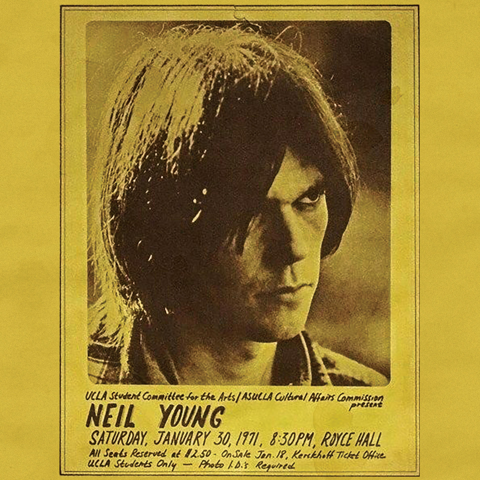 Régi poszter a Neil Young koncertre. Fekete-fehér fotó az énekesről.