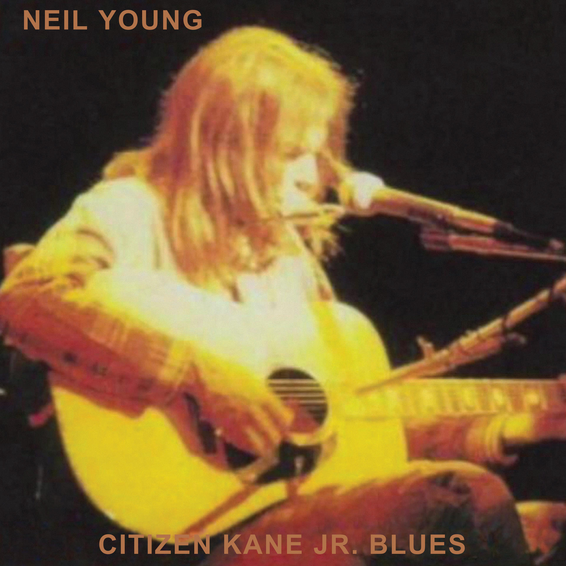 Album borító: Neil Young gitározik és énekel, alul szöveggel.