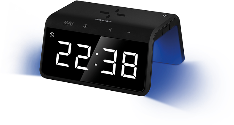 Fekete digitális ébresztőóra, 22:38-at mutat. Gombokkal és képernyővel. Fehér háttér.