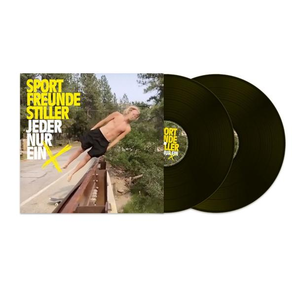 Albumcover mit zwei Vinylplatten. Ein Mann springt von einer Brücke vor einem Wald.