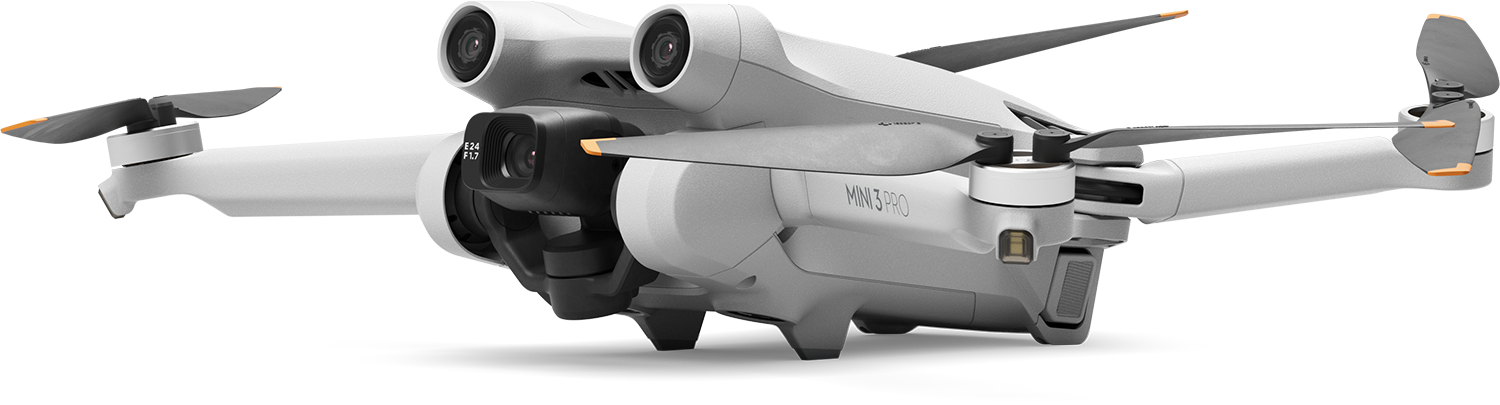Een witte drone met drie propellers. Hij heeft twee camera's en een zwarte gimbal.