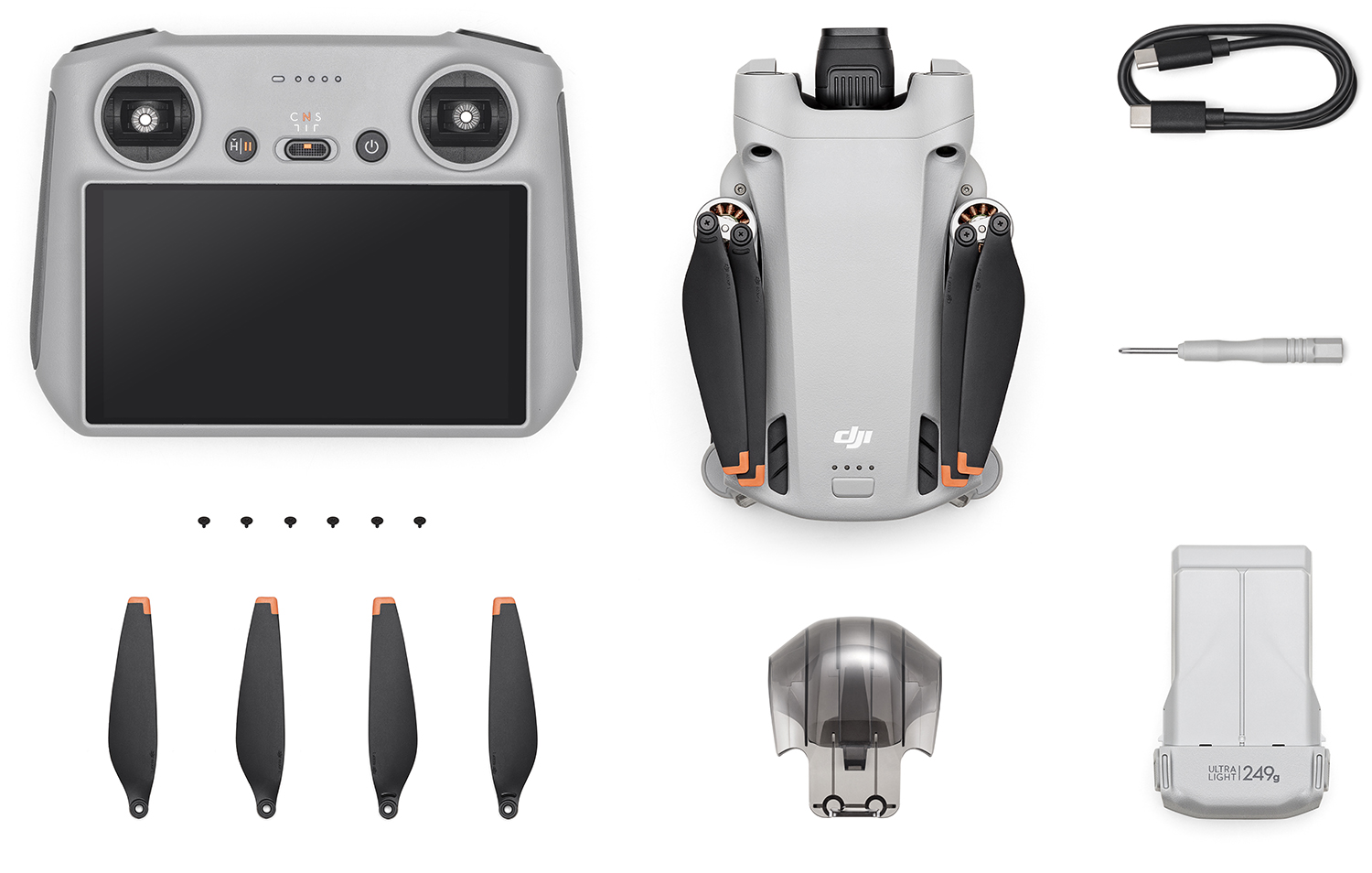 Drone en toebehoren. Inclusief afstandsbediening, propellers, batterij, schroevendraaier en oplaadkabel.