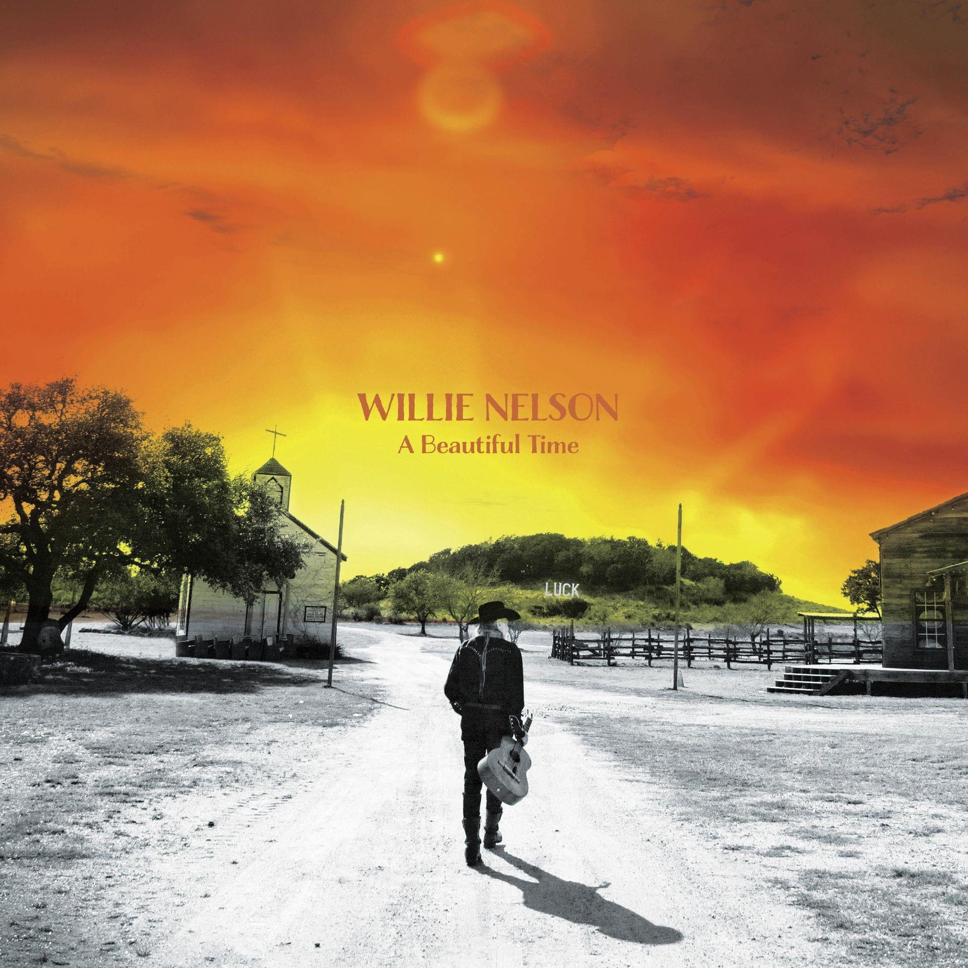 Willie Nelson album borító: Férfi gitárral távolodik egy templom és naplemente felé.