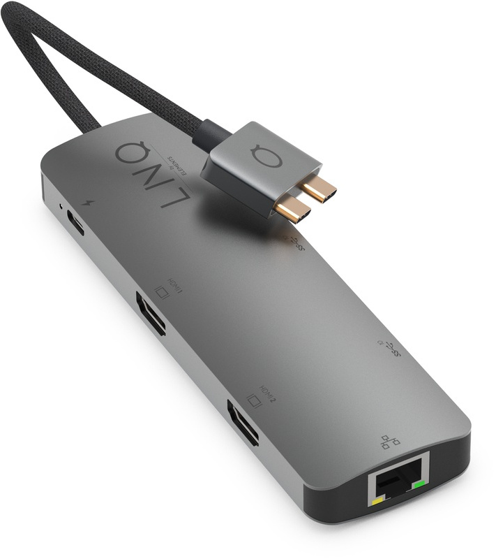 Un adaptateur multiport argenté avec des câbles connectés.