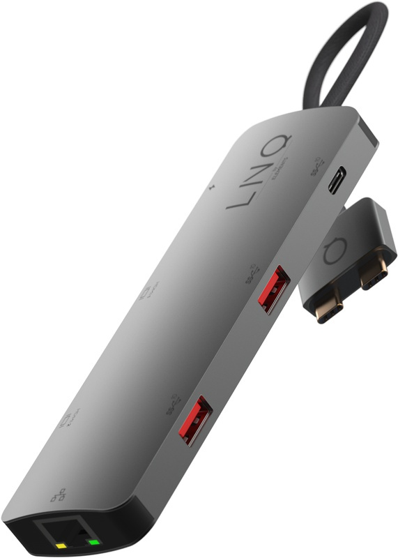 Hub USB-C gris avec plusieurs ports. Un adaptateur USB-C est attaché.
