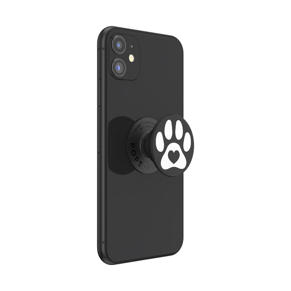 Schwarzes Telefon mit einem Pfotenabdruck-PopSocket. Der PopSocket hat einen weißen Pfotenabdruck und ein Herz.
