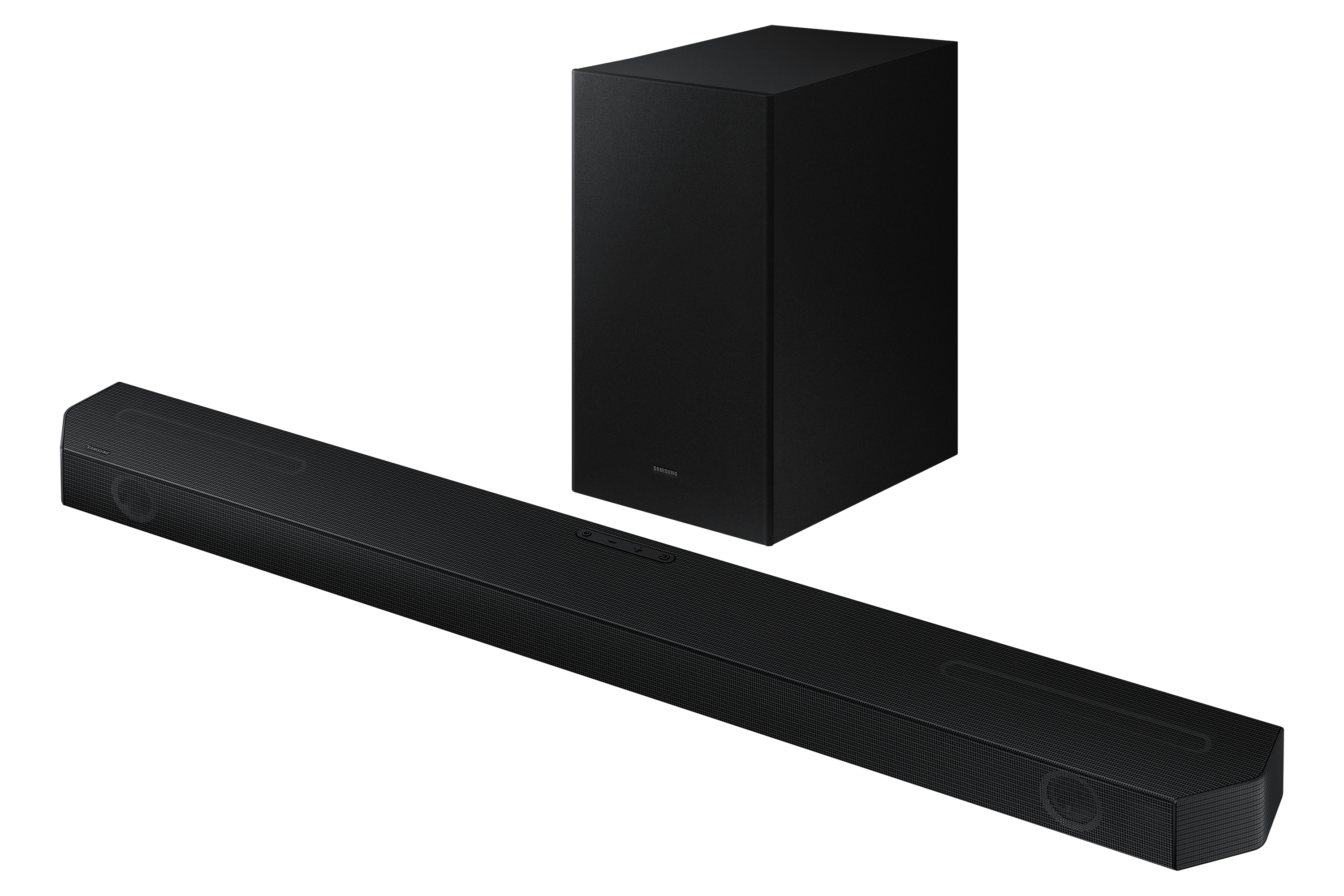 Una barra de sonido y un subwoofer negros contra un fondo negro, mostrando una configuración de cine en casa.
