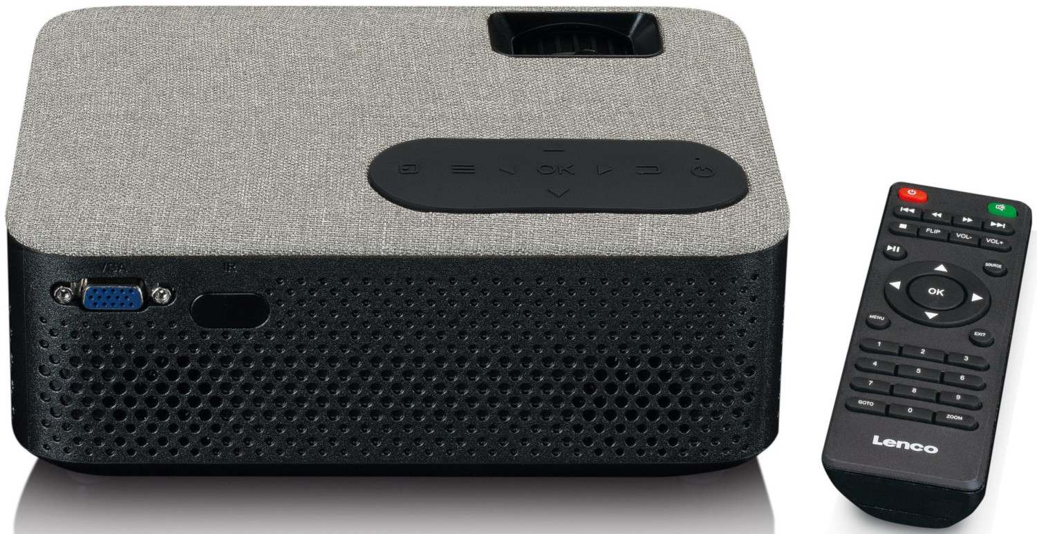 Un projecteur gris avec une façade noire et une télécommande.