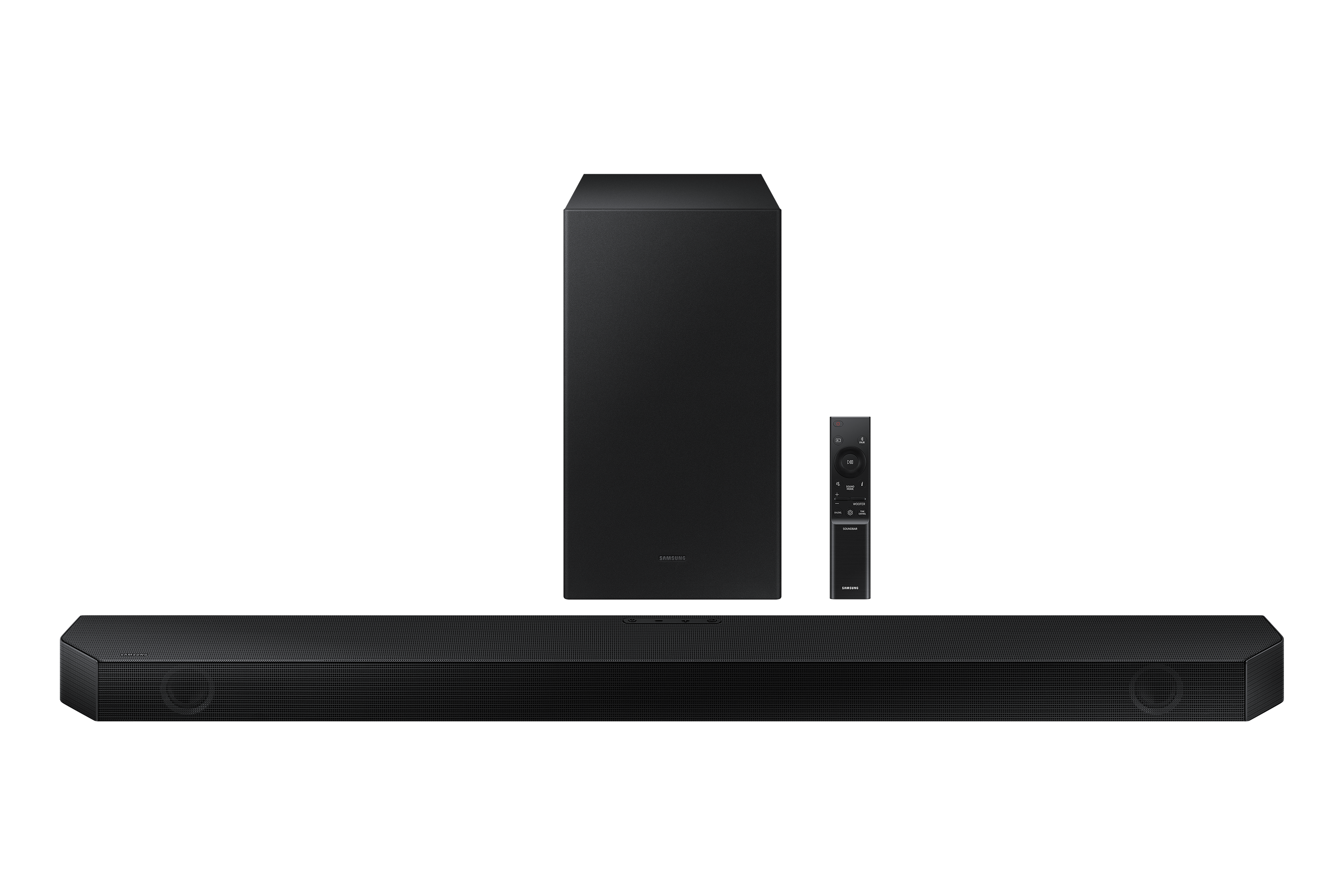 Una barra de sonido negra, un subwoofer y un mando a distancia sobre fondo negro.