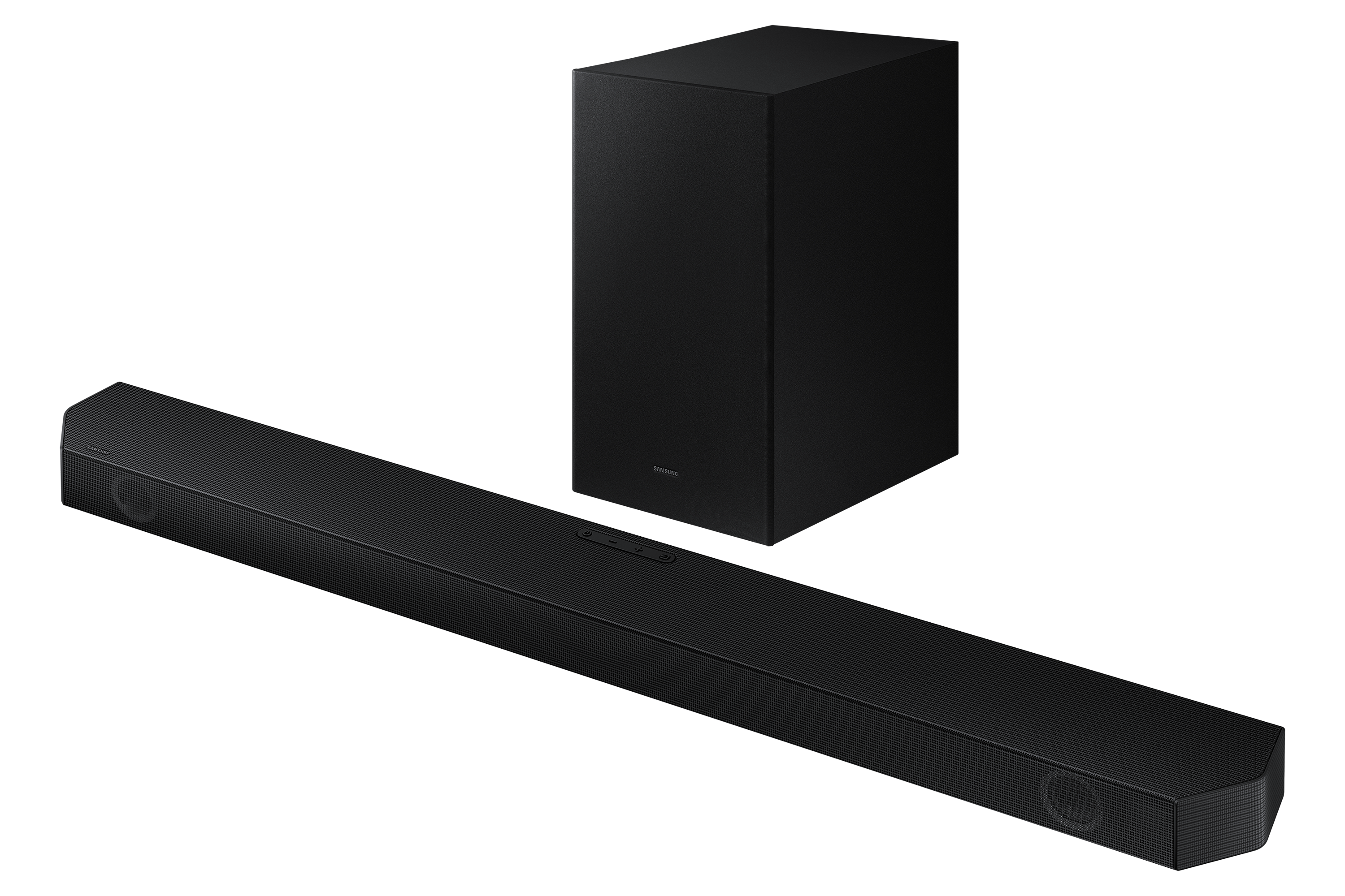 Conjunto de barra de sonido y subwoofer Samsung negros sobre fondo negro, vista en ángulo.