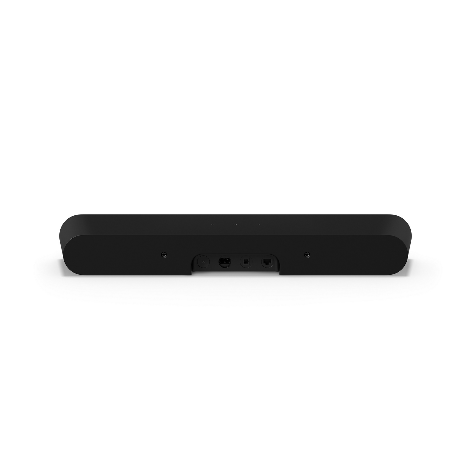 La parte trasera de una barra de sonido negra con puertos de conexión, sobre una superficie blanca.