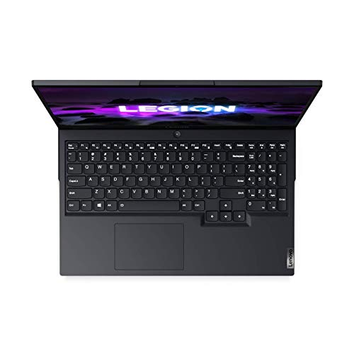 Portátil negro desde arriba, teclado visible, pantalla abierta mostrando morado y blanco.