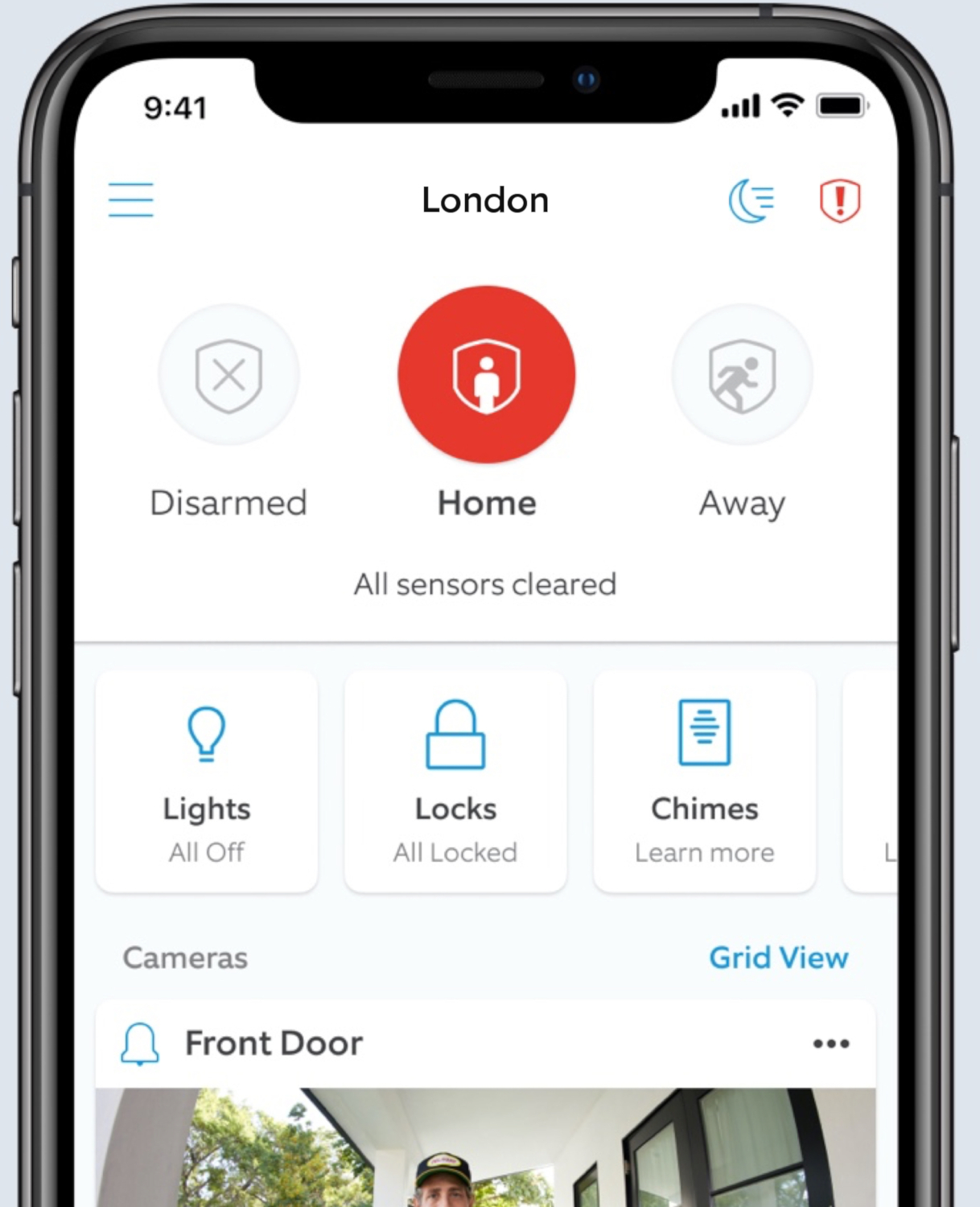 Smartphone screen showing a home security app interface. Displays arm/disarm options and device controls.