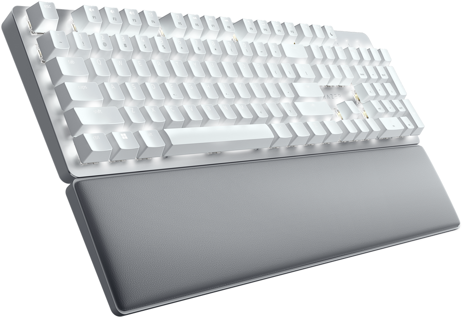 Weiße Tastatur mit grauer Handballenauflage, beleuchteten Tasten und weißer Oberfläche.