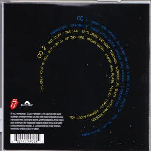 Dos du boîtier CD, fond noir avec titres de chansons en cercle.