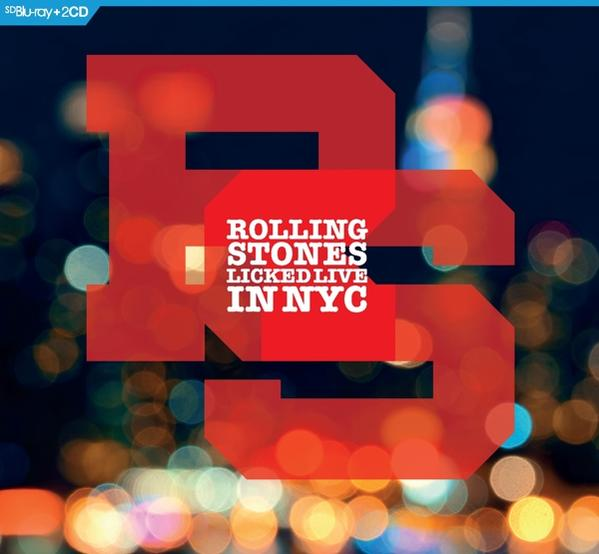 Rolling Stones Licked Live in NYC album borítója a piros ajak logóval egy elmosódott városi fény háttéren.