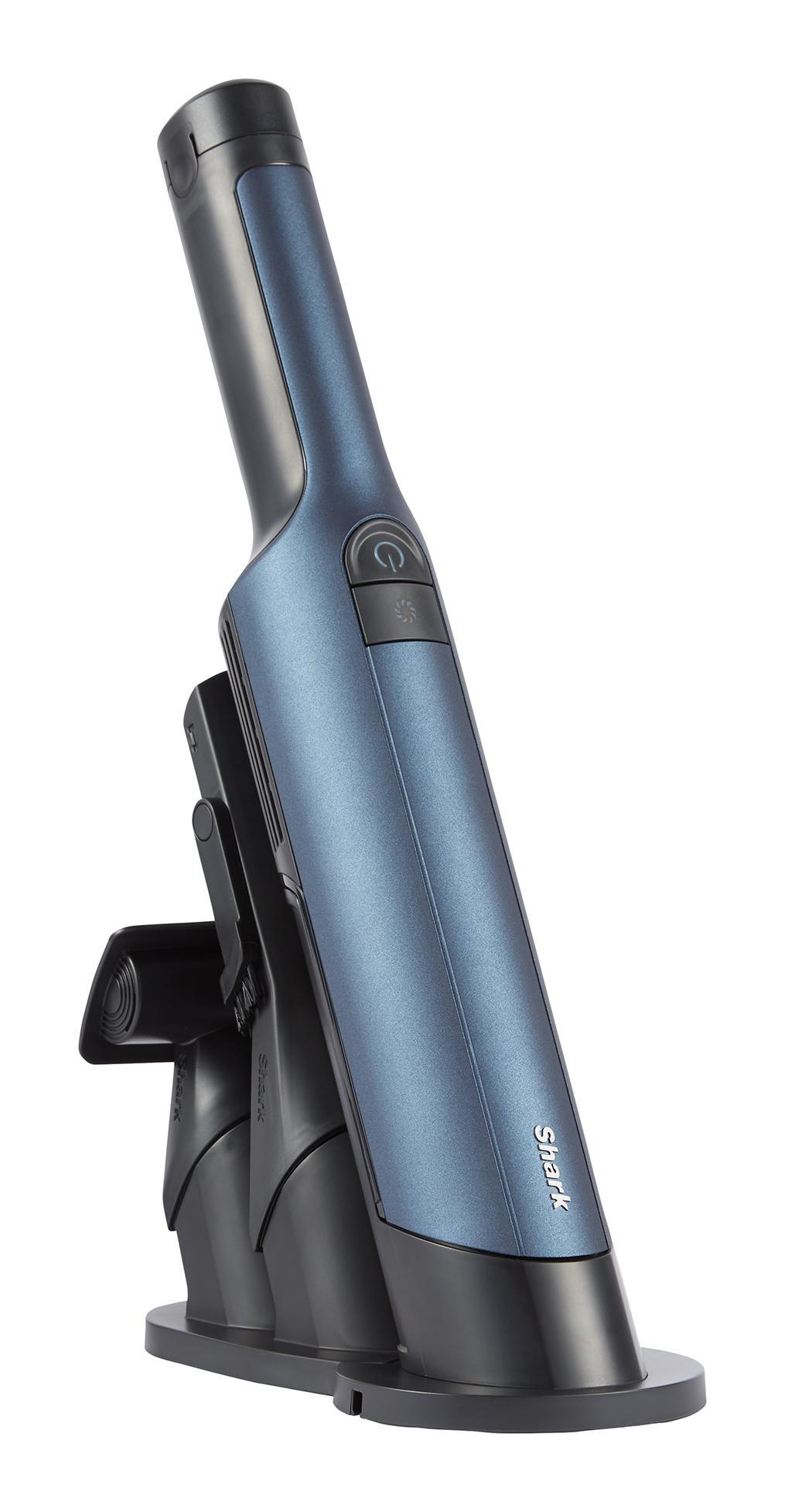 Blauer und schwarzer Shark Handstaubsauger mit Ladestation.