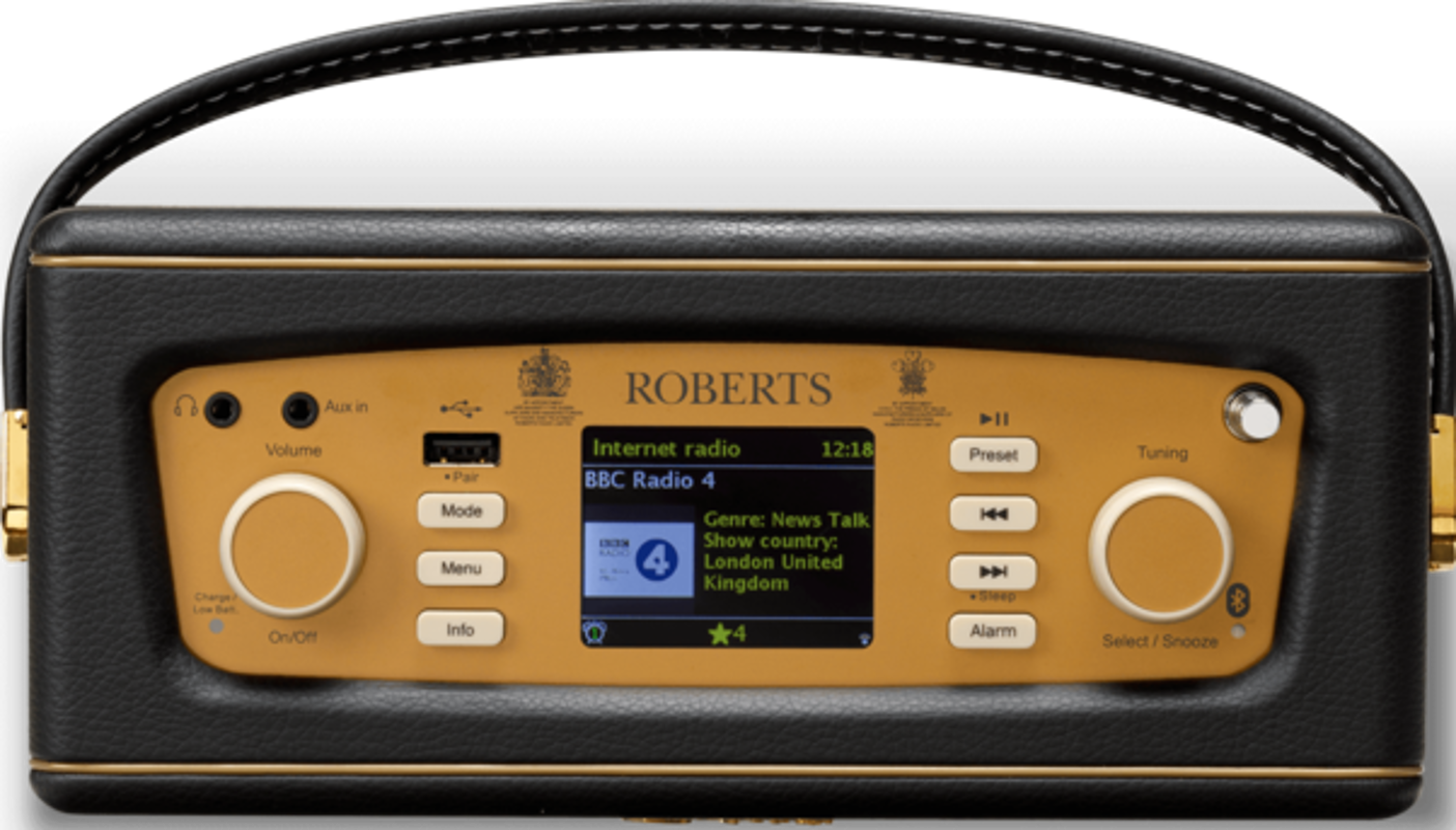 Une radio Roberts noire et dorée avec un écran affichant BBC Radio 4. Contrôles de volume, syntonisation et mode.