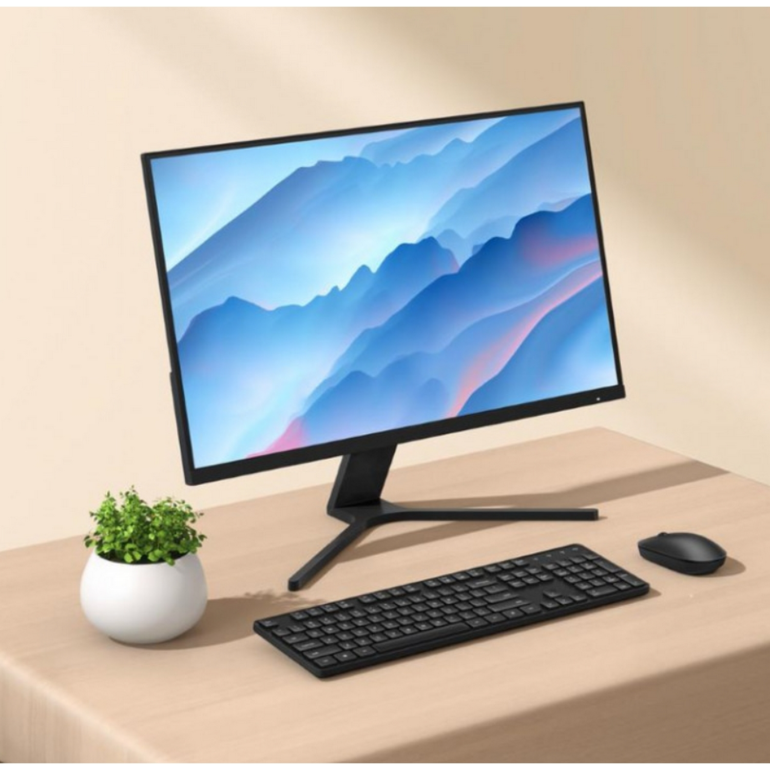 Configuración de computadora con monitor, teclado y ratón.