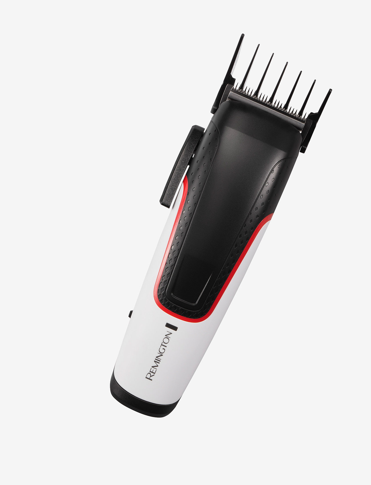 Egy fehér és fekete Remington hajvágó fehér háttér előtt.