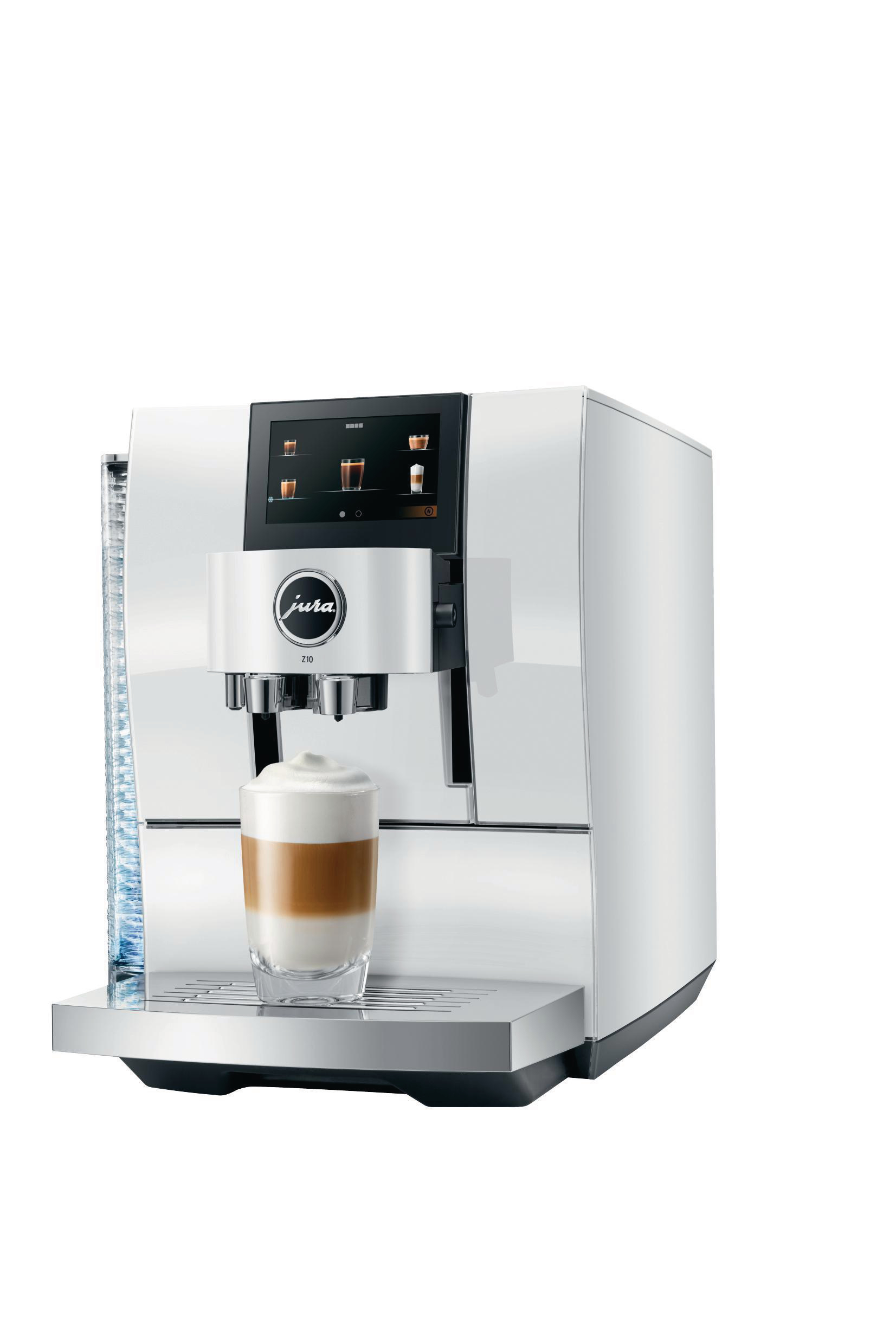 Weiße Kaffeemaschine mit Cappuccino im Glas. Ein Wasserbehälter befindet sich links.