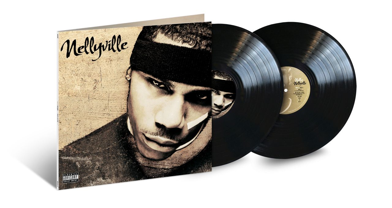 Albumcover: Nelly mit schwarzem Stirnband, Albumtitel ist Nellyville. Zwei schwarze Schallplatten sind sichtbar.