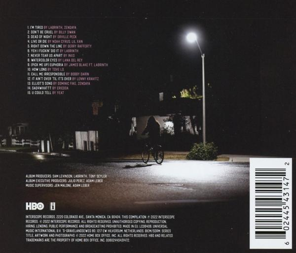 Éjszakai jelenet egy bicikliző személlyel egy utcai lámpa alatt, album részletekkel.