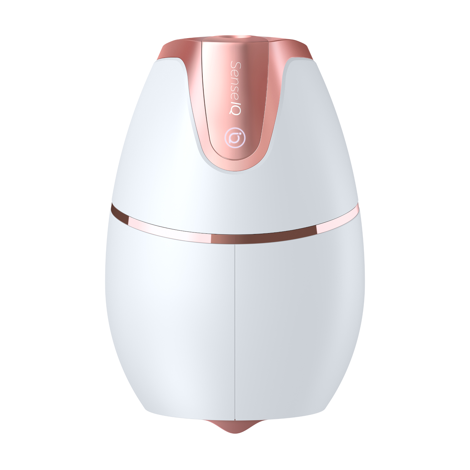 White and rose gold facial device with a rounded shape.