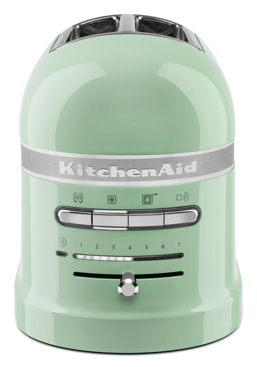 Ein grüner KitchenAid-Toaster. Er hat ein Bedienfeld mit Knöpfen und einem Drehregler. Metallische Akzente oben.